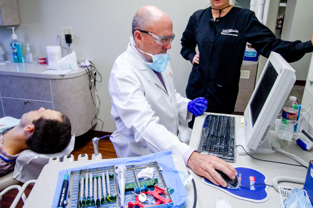 Dr. Edwards working with a patient