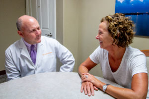 Dr. Edwards talking with a patient