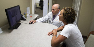 Dr. Edwards talking to a patient