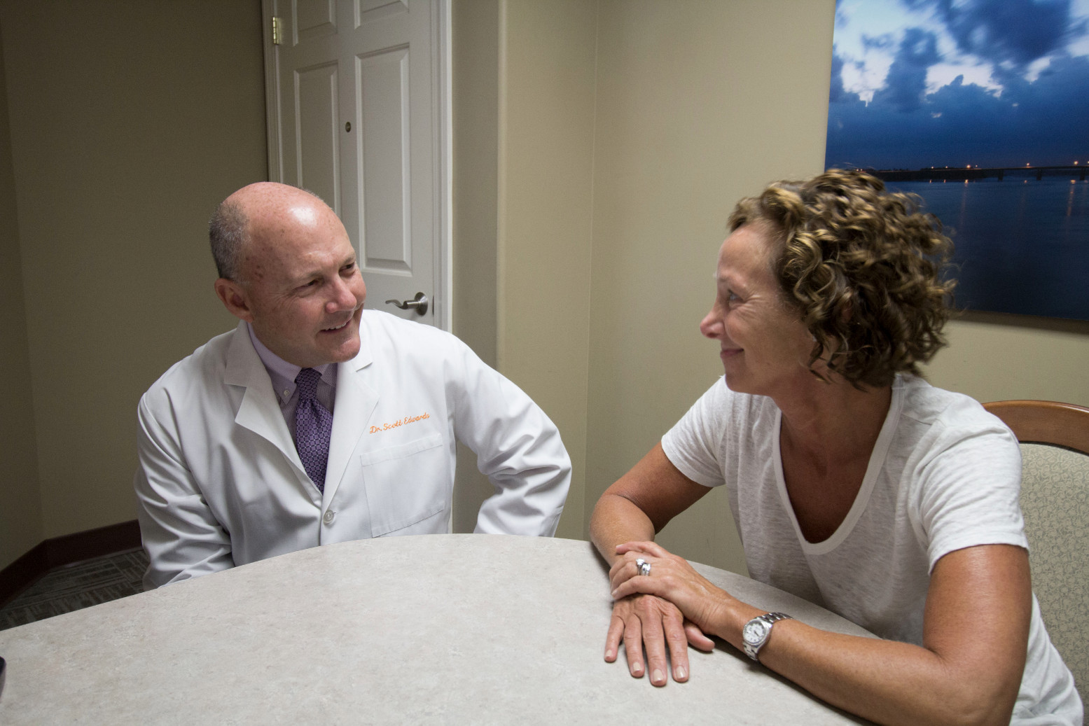 Dr. Edwards talking to a patient